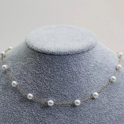 Collana Dorata con Perle Distanziate